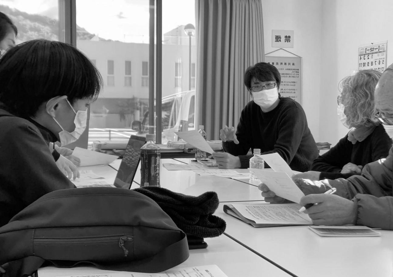 One-on-one financial coaching session demonstrating personalized budget review approach